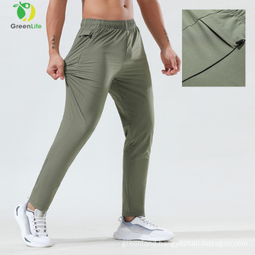 Wholesale loose nylon pants men breathable silk ice windbreaker track pants  jogger summer pants